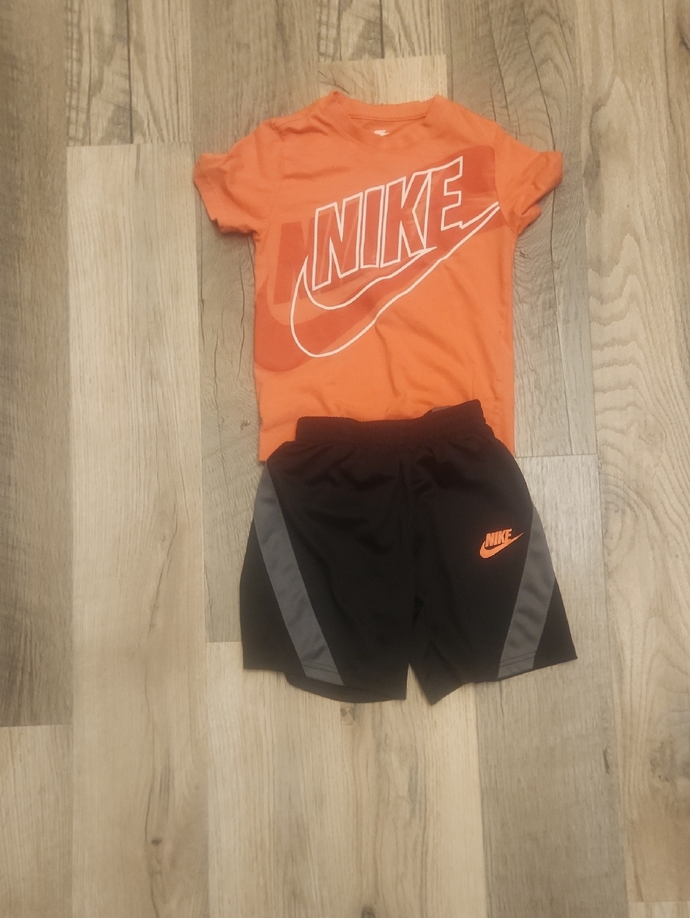 Nike Orange Graphic Tee with Black Athletic Shorts